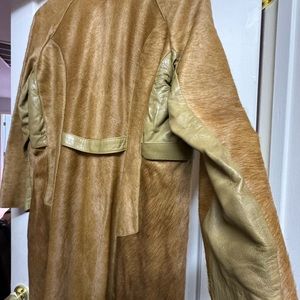 Long fall/spring coat, real leather- cow fur top layer. Sold